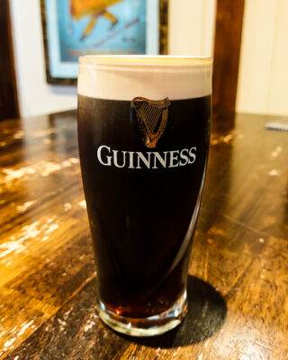 Chilled Glass of Foamy Guinness